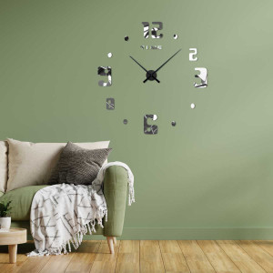 Wanduhr mit der Aufschrift TIME unter der Zahl Zwölf und einem modernen Ziffernstil. 2