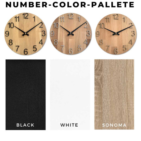 Runde Uhr mit dekorativem Ausschnitt in der Mitte und zartem Holzmuster. Runde Uhr mit dekorativem Ausschnitt in der Mitte und zartem Holzmuster.